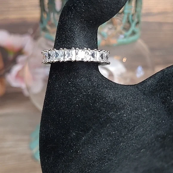 NIB STERLIG SILVER PRINCESS CUT PRONG SET ETERNITY BAND - Picture 1 of 8